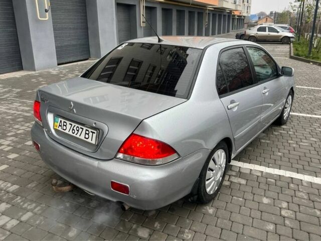 Серый Мицубиси Лансер, объемом двигателя 1.6 л и пробегом 333 тыс. км за 2800 $, фото 7 на Automoto.ua