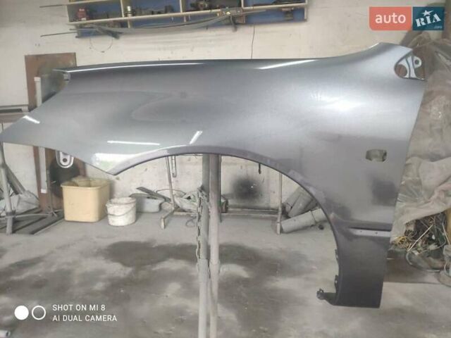 Сірий Міцубісі Lancer, об'ємом двигуна 1.58 л та пробігом 217 тис. км за 3500 $, фото 14 на Automoto.ua