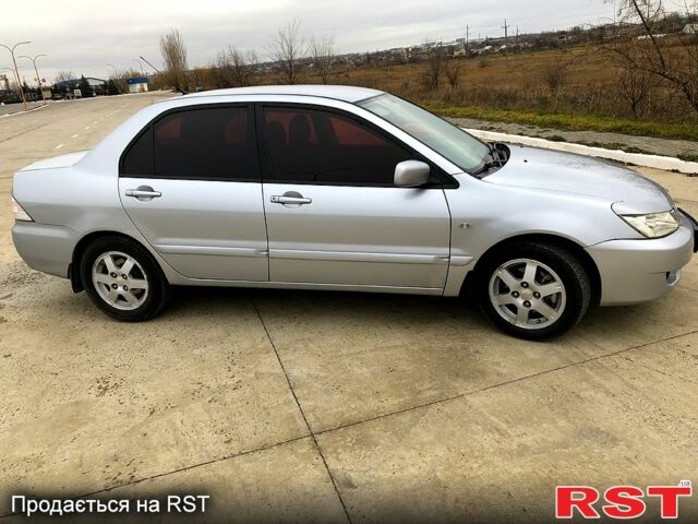 Серый Мицубиси Лансер, объемом двигателя 1.6 л и пробегом 0 тыс. км за 4000 $, фото 1 на Automoto.ua