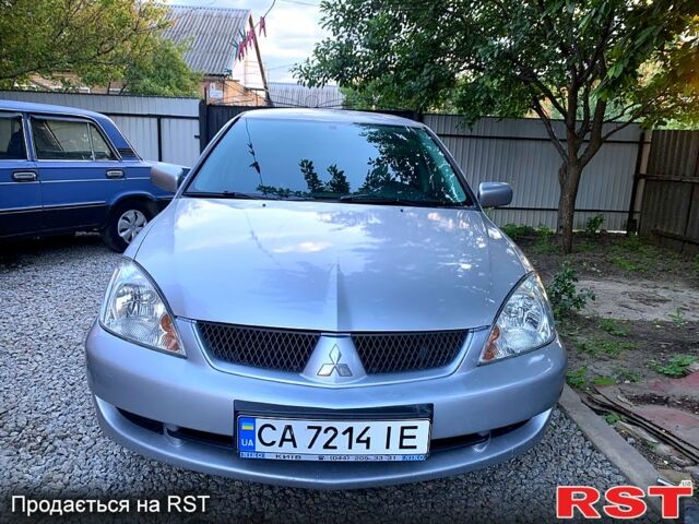 Серый Мицубиси Лансер, объемом двигателя 1.6 л и пробегом 0 тыс. км за 3999 $, фото 2 на Automoto.ua