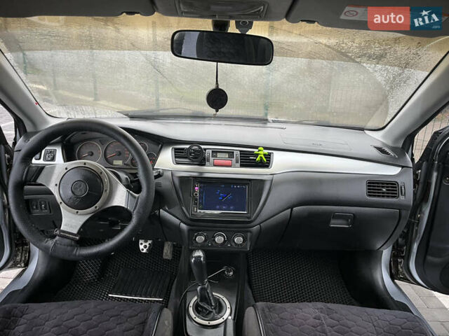 Сірий Міцубісі Lancer, об'ємом двигуна 2 л та пробігом 187 тис. км за 4500 $, фото 19 на Automoto.ua