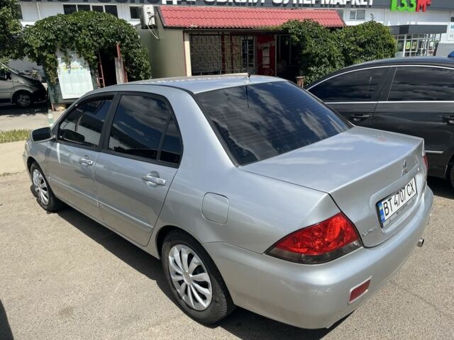 Міцубісі Lancer 2006 у Полтаві на Automoto.ua Сірий Міцубісі Lancer, об'ємом двигуна 1.6 л та пробігом 250 тис. км за 4500 $, фото 2 на Automoto.ua