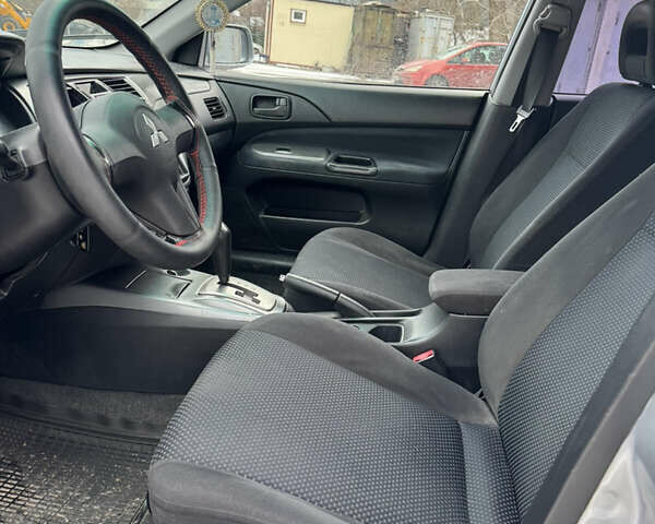 Серый Мицубиси Лансер, объемом двигателя 1.58 л и пробегом 220 тыс. км за 3990 $, фото 4 на Automoto.ua