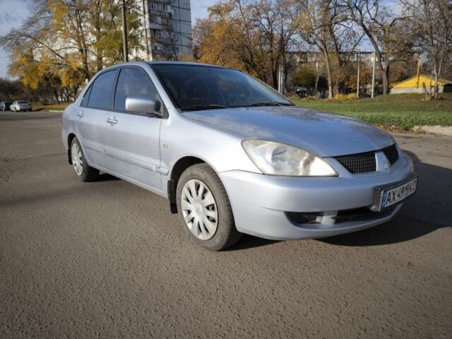 Сірий Міцубісі Lancer, об'ємом двигуна 1.6 л та пробігом 340 тис. км за 3000 $, фото 2 на Automoto.ua