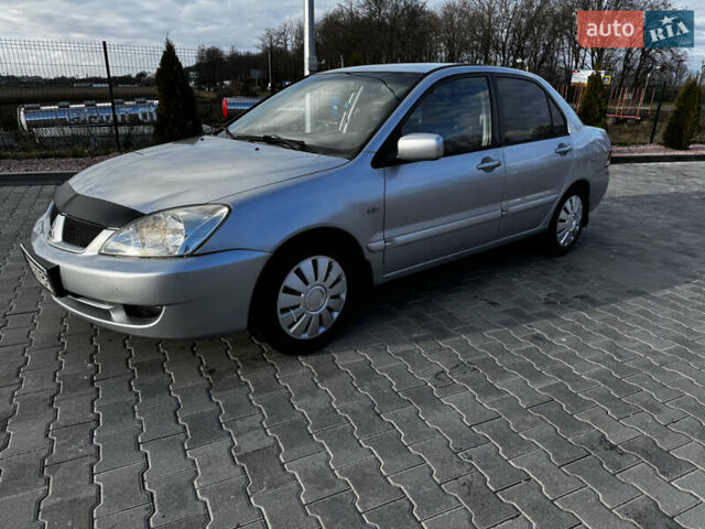 Сірий Міцубісі Lancer, об'ємом двигуна 1.58 л та пробігом 333 тис. км за 2700 $, фото 5 на Automoto.ua