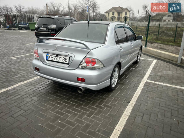 Сірий Міцубісі Lancer, об'ємом двигуна 2 л та пробігом 187 тис. км за 4500 $, фото 7 на Automoto.ua