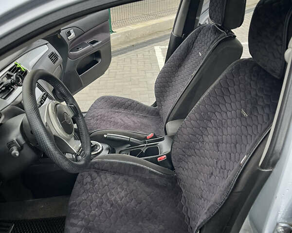 Сірий Міцубісі Lancer, об'ємом двигуна 2 л та пробігом 187 тис. км за 4500 $, фото 16 на Automoto.ua