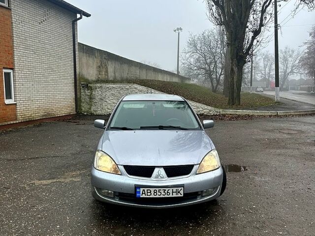 Серый Мицубиси Лансер, объемом двигателя 1.6 л и пробегом 123 тыс. км за 4000 $, фото 2 на Automoto.ua