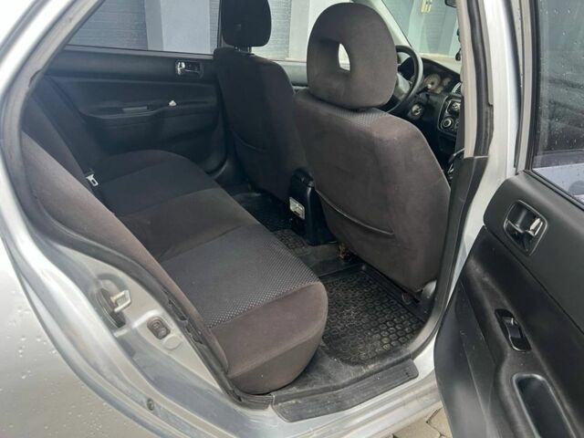 Серый Мицубиси Лансер, объемом двигателя 1.6 л и пробегом 333 тыс. км за 2800 $, фото 13 на Automoto.ua