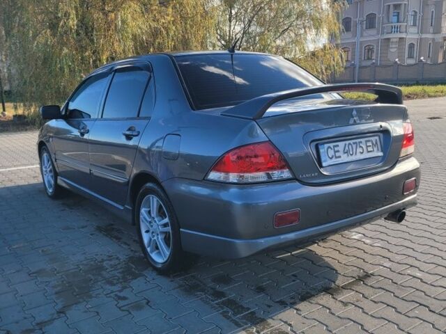 Мицубиси Лансер 2006 в Черновцах на Automoto.ua Серый Мицубиси Лансер, объемом двигателя 1.6 л и пробегом 263 тыс. км за 4500 $, фото 1 на Automoto.ua