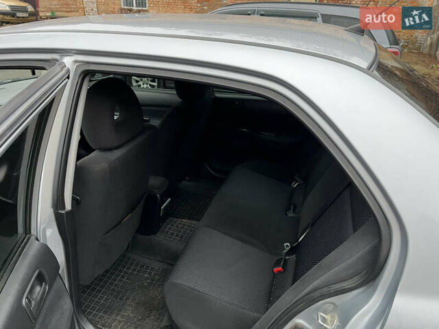 Сірий Міцубісі Lancer, об'ємом двигуна 1.58 л та пробігом 308 тис. км за 3700 $, фото 13 на Automoto.ua