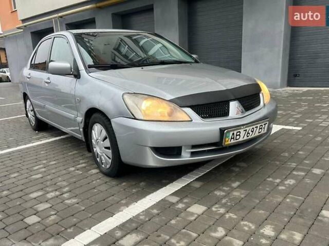 Серый Мицубиси Лансер, объемом двигателя 1.6 л и пробегом 333 тыс. км за 2800 $, фото 1 на Automoto.ua