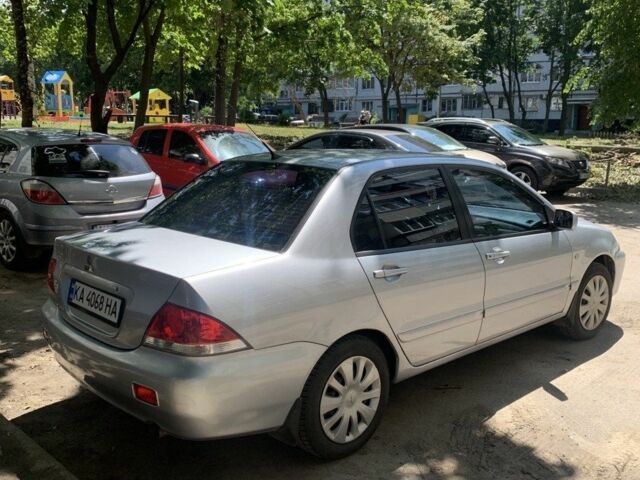 Серый Мицубиси Лансер, объемом двигателя 1.6 л и пробегом 140 тыс. км за 5000 $, фото 2 на Automoto.ua