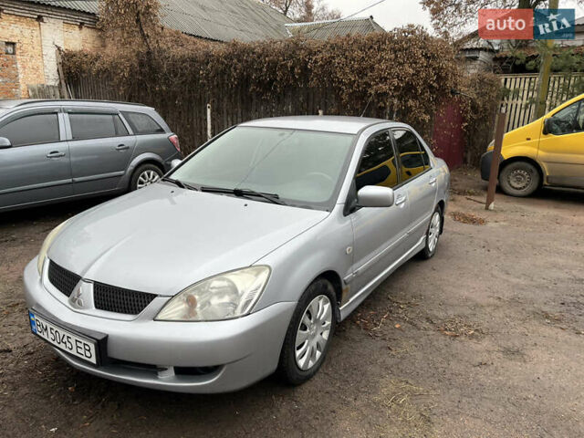 Сірий Міцубісі Lancer, об'ємом двигуна 1.58 л та пробігом 308 тис. км за 3700 $, фото 2 на Automoto.ua