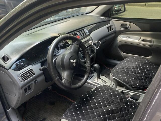 Сірий Міцубісі Lancer, об'ємом двигуна 1.6 л та пробігом 2 тис. км за 4750 $, фото 1 на Automoto.ua