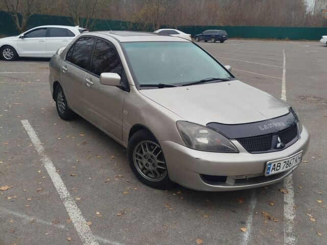 Сірий Міцубісі Lancer, об'ємом двигуна 2 л та пробігом 330 тис. км за 3450 $, фото 1 на Automoto.ua
