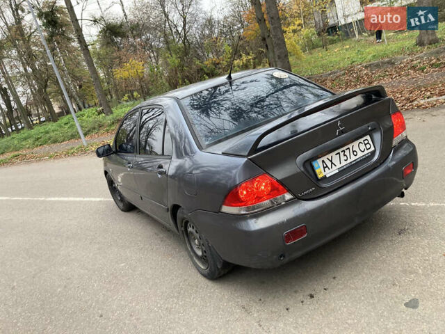 Сірий Міцубісі Lancer, об'ємом двигуна 1.6 л та пробігом 222 тис. км за 4900 $, фото 4 на Automoto.ua