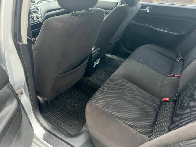 Серый Мицубиси Лансер, объемом двигателя 1.6 л и пробегом 333 тыс. км за 2800 $, фото 12 на Automoto.ua