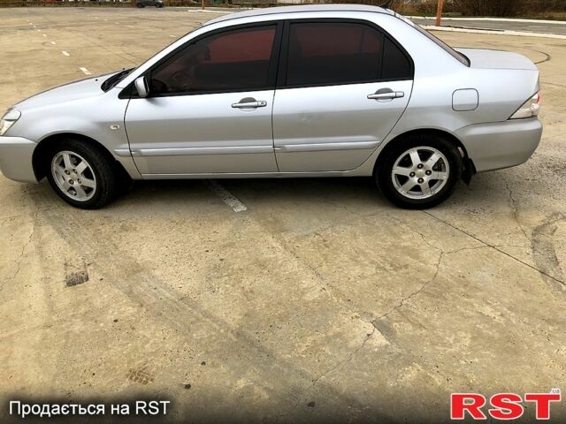 Серый Мицубиси Лансер, объемом двигателя 1.6 л и пробегом 0 тыс. км за 4000 $, фото 2 на Automoto.ua