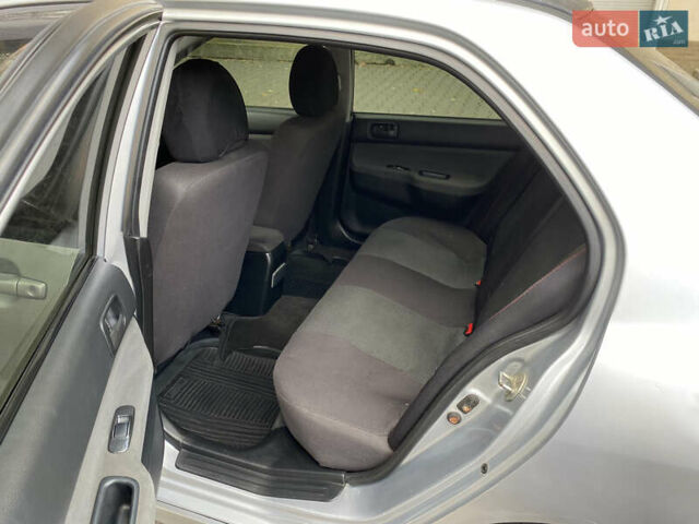 Серый Мицубиси Лансер, объемом двигателя 1.6 л и пробегом 444 тыс. км за 3400 $, фото 16 на Automoto.ua