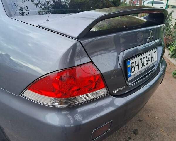 Сірий Міцубісі Lancer, об'ємом двигуна 1.6 л та пробігом 229 тис. км за 4900 $, фото 2 на Automoto.ua
