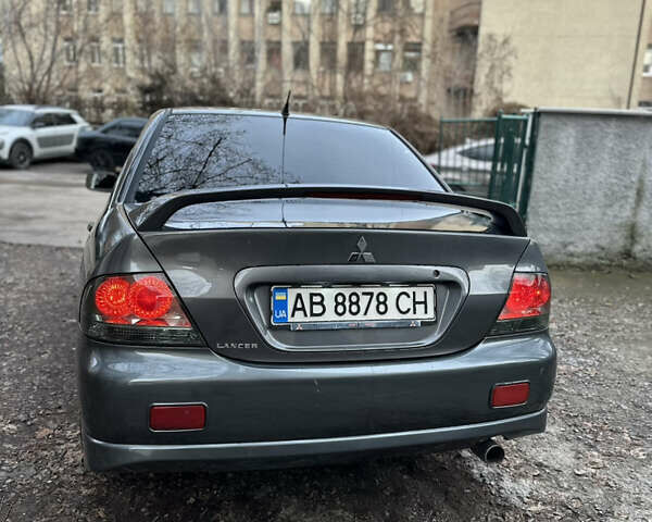Сірий Міцубісі Lancer, об'ємом двигуна 2 л та пробігом 200 тис. км за 4999 $, фото 10 на Automoto.ua