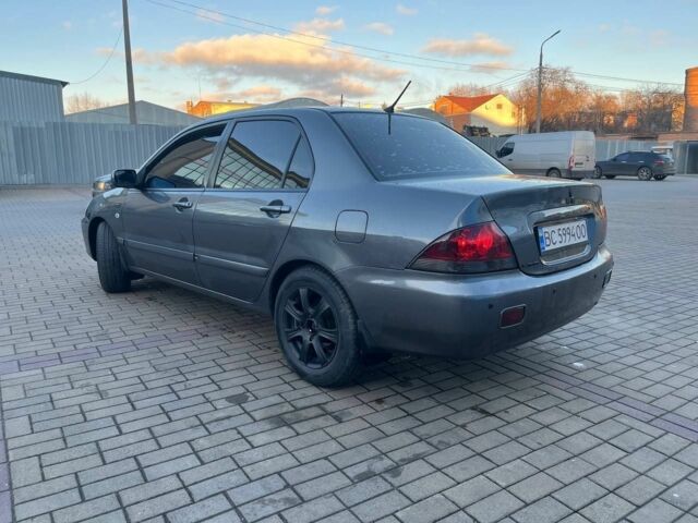 Серый Мицубиси Лансер, объемом двигателя 1.6 л и пробегом 279 тыс. км за 3990 $, фото 2 на Automoto.ua