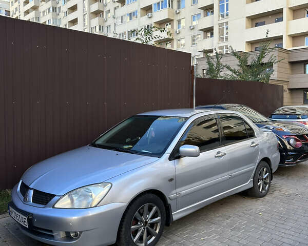 Серый Мицубиси Лансер, объемом двигателя 1.58 л и пробегом 244 тыс. км за 4950 $, фото 17 на Automoto.ua