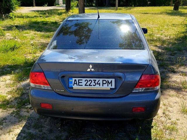 Серый Мицубиси Лансер, объемом двигателя 1.6 л и пробегом 214 тыс. км за 4500 $, фото 5 на Automoto.ua