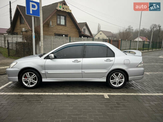 Сірий Міцубісі Lancer, об'ємом двигуна 2 л та пробігом 187 тис. км за 4500 $, фото 9 на Automoto.ua