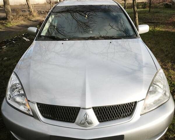 Серый Мицубиси Лансер, объемом двигателя 1.6 л и пробегом 234 тыс. км за 4300 $, фото 8 на Automoto.ua