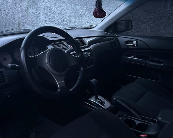 Сірий Міцубісі Lancer, об'ємом двигуна 2 л та пробігом 200 тис. км за 4999 $, фото 13 на Automoto.ua