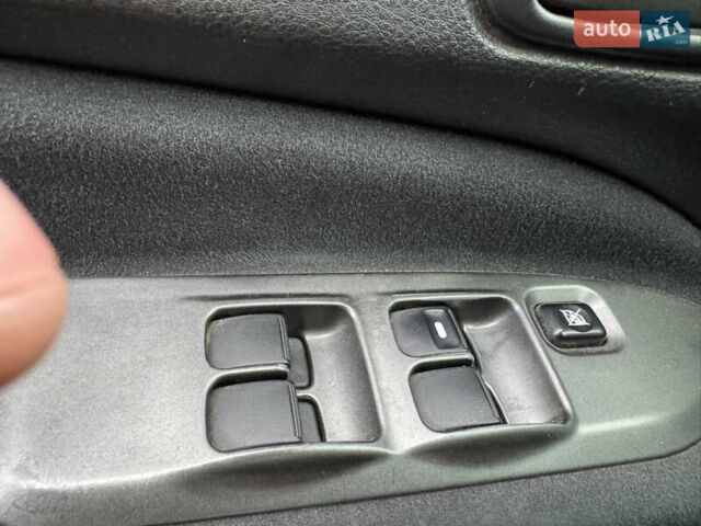 Серый Мицубиси Лансер, объемом двигателя 1.6 л и пробегом 242 тыс. км за 4300 $, фото 19 на Automoto.ua