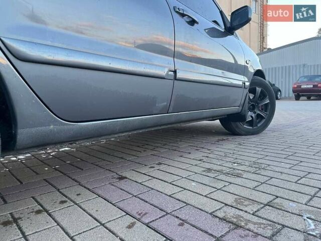 Серый Мицубиси Лансер, объемом двигателя 1.6 л и пробегом 279 тыс. км за 3990 $, фото 6 на Automoto.ua