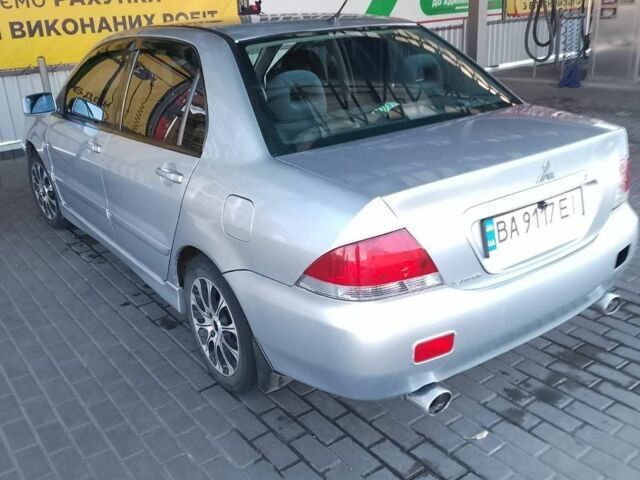 Сірий Міцубісі Lancer, об'ємом двигуна 1.6 л та пробігом 40 тис. км за 6000 $, фото 5 на Automoto.ua