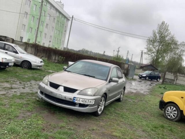 Сірий Міцубісі Lancer, об'ємом двигуна 2 л та пробігом 140 тис. км за 1400 $, фото 1 на Automoto.ua