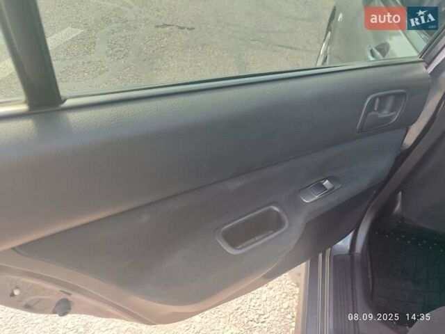 Сірий Міцубісі Lancer, об'ємом двигуна 1.6 л та пробігом 242 тис. км за 4900 $, фото 15 на Automoto.ua