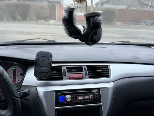 Серый Мицубиси Лансер, объемом двигателя 2 л и пробегом 256 тыс. км за 7000 $, фото 8 на Automoto.ua