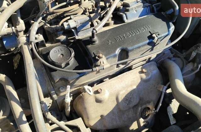 Сірий Міцубісі Lancer, об'ємом двигуна 1.6 л та пробігом 229 тис. км за 4900 $, фото 30 на Automoto.ua