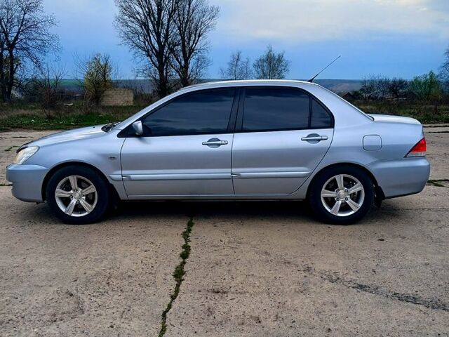 Сірий Міцубісі Lancer, об'ємом двигуна 1.6 л та пробігом 220 тис. км за 5300 $, фото 3 на Automoto.ua