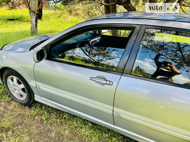 Сірий Міцубісі Lancer, об'ємом двигуна 1.6 л та пробігом 203 тис. км за 5000 $, фото 3 на Automoto.ua