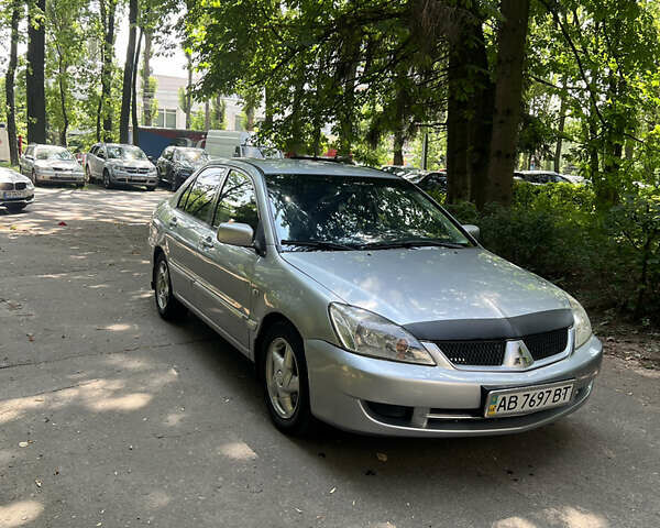 Сірий Міцубісі Lancer, об'ємом двигуна 1.6 л та пробігом 331 тис. км за 3100 $, фото 1 на Automoto.ua