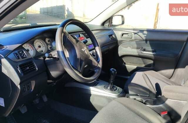 Сірий Міцубісі Lancer, об'ємом двигуна 1.6 л та пробігом 229 тис. км за 4900 $, фото 14 на Automoto.ua