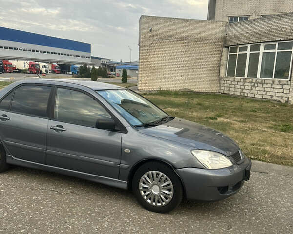 Серый Мицубиси Лансер, объемом двигателя 1.58 л и пробегом 302 тыс. км за 3700 $, фото 6 на Automoto.ua