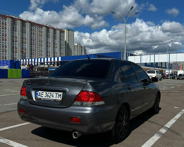 Сірий Міцубісі Lancer, об'ємом двигуна 1.6 л та пробігом 223 тис. км за 4500 $, фото 1 на Automoto.ua