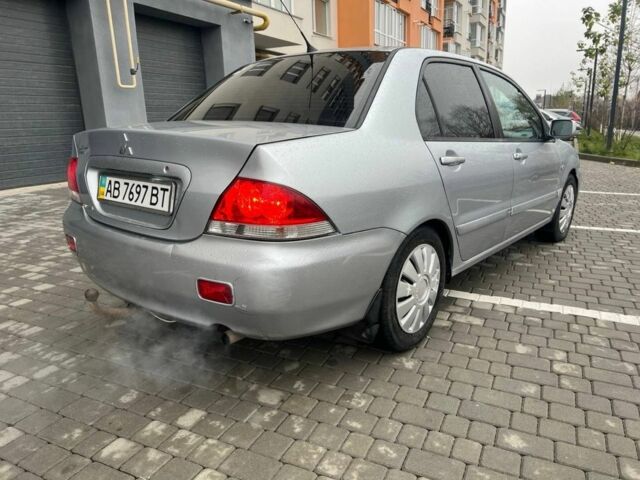 Серый Мицубиси Лансер, объемом двигателя 1.6 л и пробегом 333 тыс. км за 2800 $, фото 6 на Automoto.ua