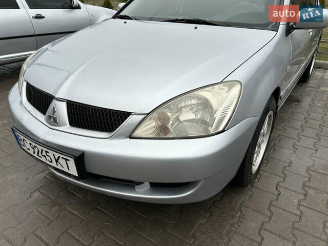 Сірий Міцубісі Lancer, об'ємом двигуна 1.6 л та пробігом 223 тис. км за 3900 $, фото 7 на Automoto.ua
