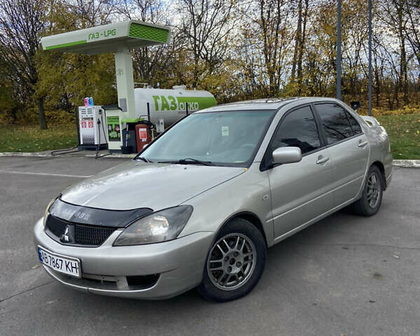 Мицубиси Лансер 2006 в Погребище на Automoto.ua Серый Мицубиси Лансер, объемом двигателя 2 л и пробегом 320 тыс. км за 3300 $, фото 6 на Automoto.ua