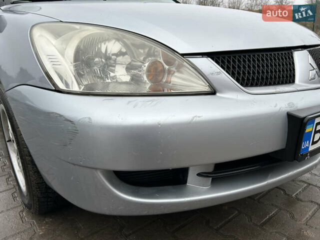 Сірий Міцубісі Lancer, об'ємом двигуна 1.6 л та пробігом 223 тис. км за 3900 $, фото 5 на Automoto.ua