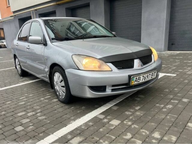 Серый Мицубиси Лансер, объемом двигателя 1.6 л и пробегом 333 тыс. км за 2800 $, фото 1 на Automoto.ua